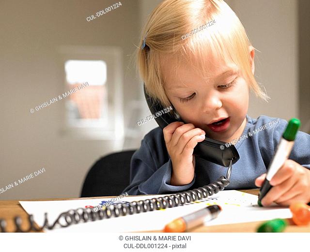 Little girl on the phone