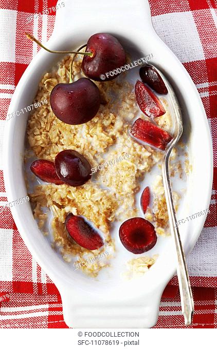 Bowl of Steel Cut Oats with Milk and Cherries, From Above