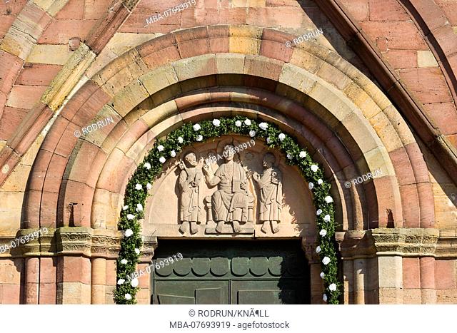 Germany, Baden-WÃ¼rttemberg, RheinmÃ¼nster, Minster Schwarzach, tympanum with Christ between the Apostles Peter and Paul on the west portal of the former...