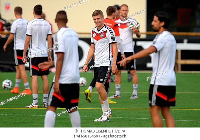 Toni Kroos (C) during a training session of the German national soccer team at the training center in Santo Andre, Brazil, 10 July 2014