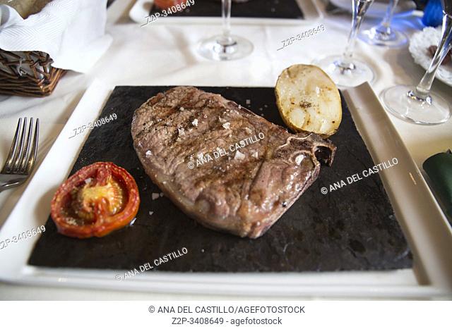Grilled striploin steak on slate