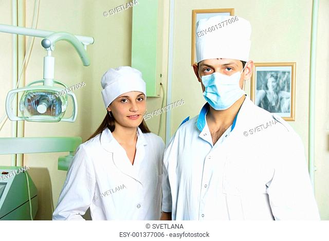 two doctors in dentistry office