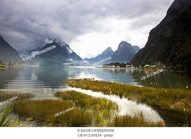 Tranquil lake and mountains, Milford Sound, South Island, New Zealand