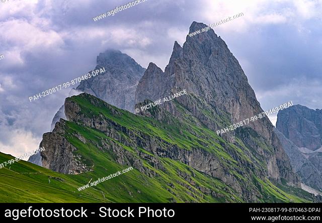 21 July 2023, Italy, St. Ulrich: View of the mountain peaks at the Seceda Alm. The Seceda Alm is located on the sunny side of Val Gardena