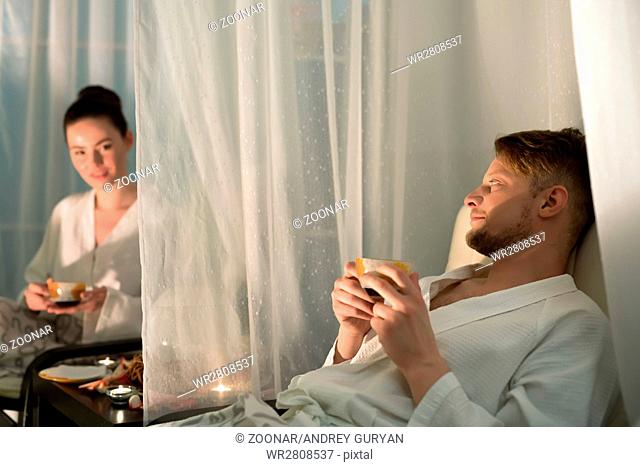 Young couple relaxing in wellness center