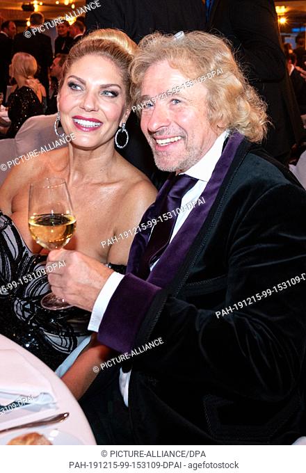 15 December 2019, Baden-Wuerttemberg, Baden-Baden: Thomas Gottschalk and his girlfriend Karina Mross are sitting at a table in the Kurhaus before being voted...