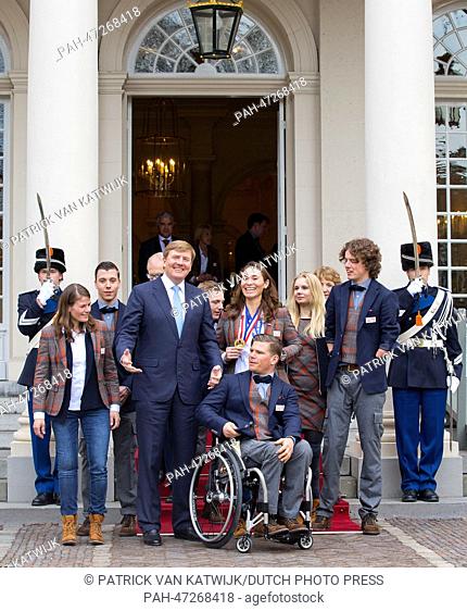 Dutch King Willem-Alexander (C), receives Dutch participants of the Paralympic Games 2014 in Sochi, Bibian Mentel (Gold, Snowboard, center R)
