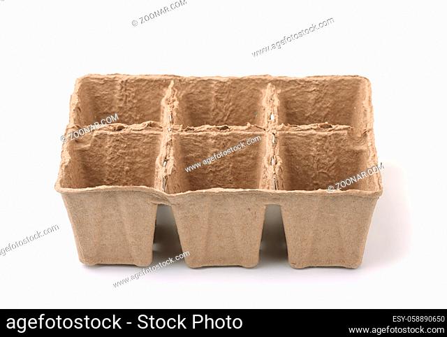 Front view of biodegradable pulp peat seedling pot isolated on white