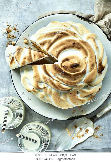 An orange and almond cake with a meringue topping