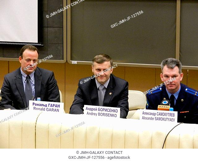Expedition 27 prime crew members Ron Garan of NASA (left), and Russian cosmonauts Andrey Borisenko and Alexander Samokutyaev participate in a news conference...