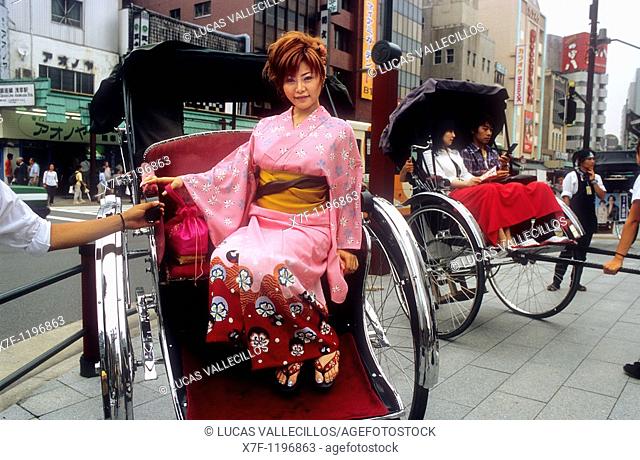 Asakusa Rickshaws woman dressed in traditional kimono  Kaminarimon Dori Tokyo city, Japan, Asia
