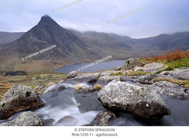 Water cascading down a fall on the Afon Lloer, overlooking the Ogwen Valley and Tryfan in the Glyderau mountain range, Snowdonia, Wales, United Kingdom, Europe