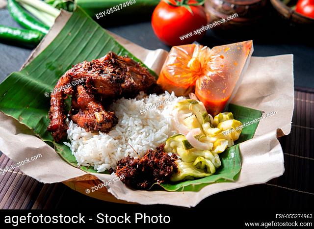 Nasi lemak kukus with quail, popular traditional Malay local food