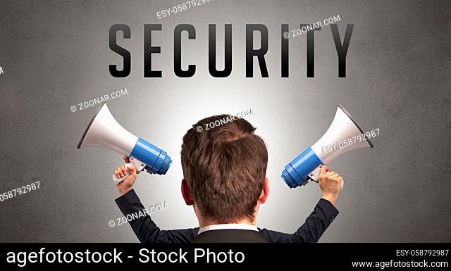 Rear view of a businessman with SECURITY inscription, cyber security concept