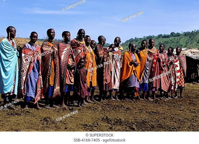Kenya, Masai Mara, Masai Village, Women Singing Welcoming Song