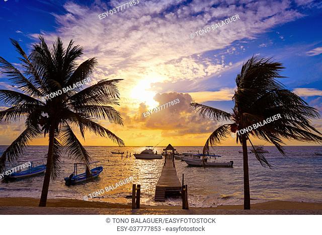 Riviera Maya sunrise pier in Caribbean Mayan Mexico