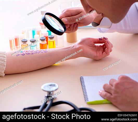 The doctor testing allergy reaction of patient in hospital