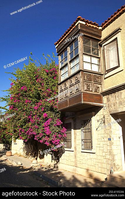 View of a traditional Ottoman house with bay window at the center of Alacati district, Cesme town, Izmir, Aegean Region, Turkey, Europe