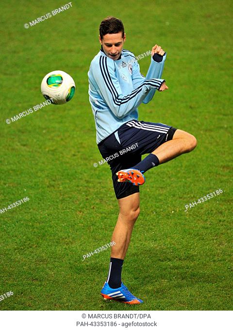 German national soccer player Julian Draxler plays the ball during the final training before the match against Sweden at Friends Arena Solna in Stockholm