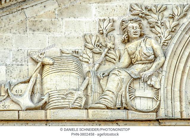France, Gironde, Castillon-la-Bataille, allegorical bas-relief depicting the wine-producing craft on the front of a wine-warehouse