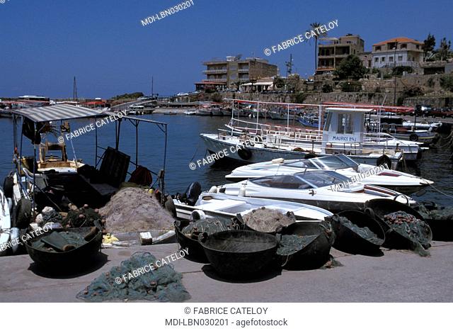 Fishing boats, cruise ships and pleasure boats in the harbour