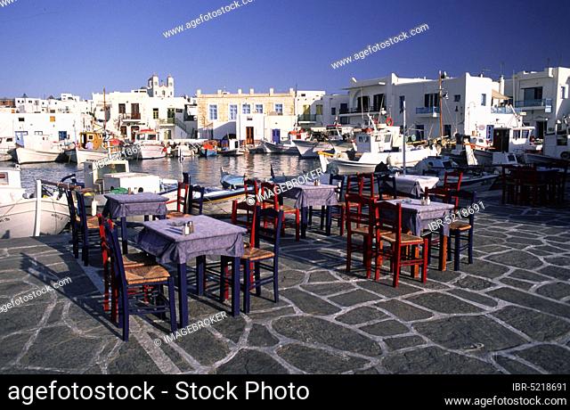 Terrace of a restaurant in the old fishing harbour of Naoussa, Paros, Cyclades, Greece, Terrace of a restaurant in the old fishing harbour of Naoussa, Paros
