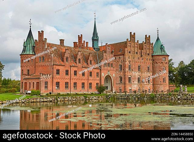 FUNEN, DENMARK - SEPTEMBER 17, 2017: Egeskov Castle is Europe's best preserved Renaissance water castle and it's located in the south of the island of Funen in...