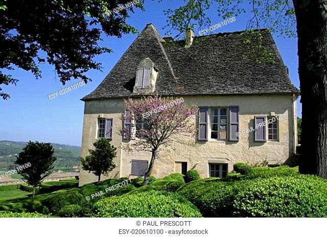 traditional old house in landscaped gardens, marqueyssac, france