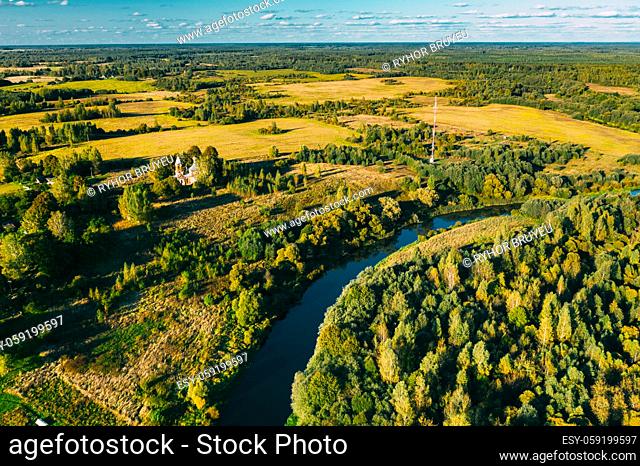 Martinovo, Beshenkovichsky District, Vitebsk Region, Belarus. Village Cityscape Skyline In Autumn Sunny Evening. Bird's-eye View Of Church Of The Intercession...