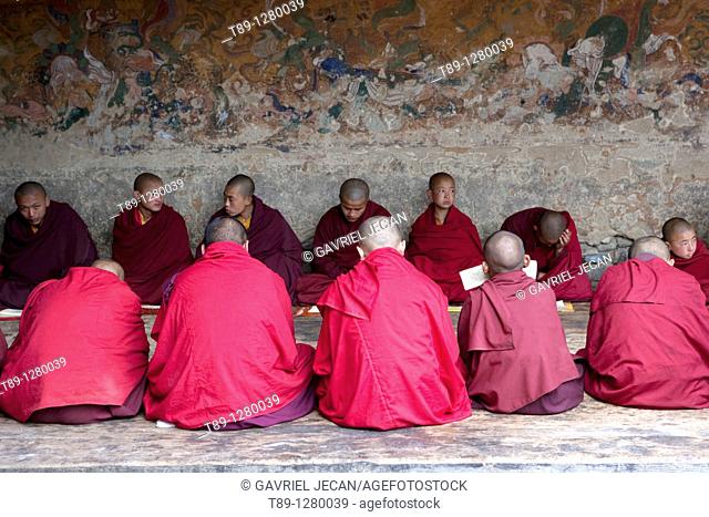 Monks chanting in the temple