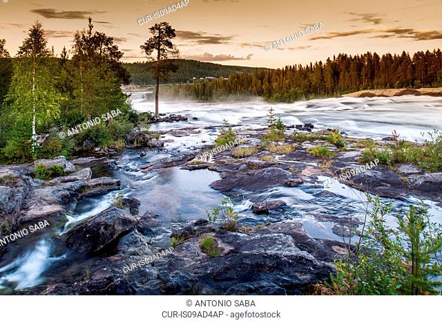 View of river flowing over rocks, Storforsen, Lapland, Sweden