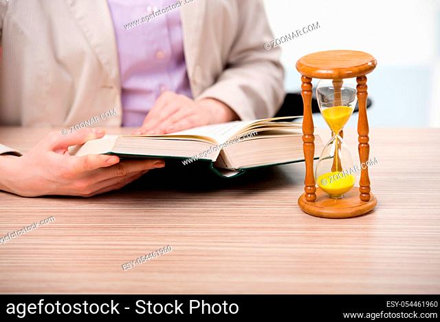 Hourglasses in business concept in time concept