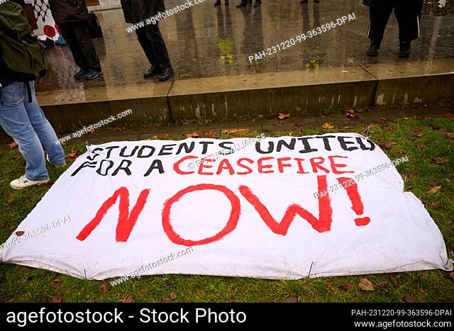 20 December 2023, Berlin: ""Students united for a ceasefire now!"" is written on a banner on the ground during the protest with the slogan ""Students united for...