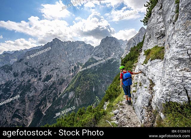 Young hiker on the Sentiero Carlo Minazio path, Sorapiss circuit, Dolomites, Belluno, Italy, Europe