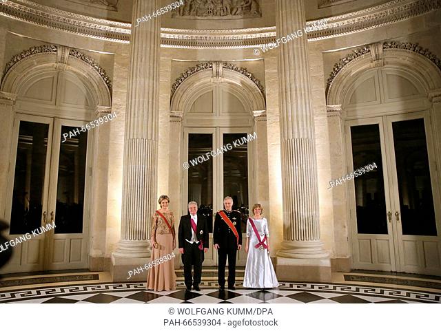 Gerrman President Joachim Gauck (2nd L) and his partner Daniela Schadt (r) stand next to Queen Mathilde (l) during a state banquette at Laaken Palace...