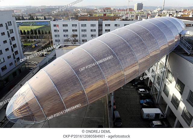 A large wooden construction shaped like an airship, built on the roof of the contemporary art DOX centre in Prague by architect Martin Rajnis