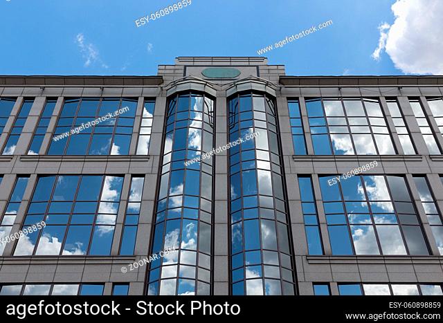 Facade of modern office building with glass windows in Budapest, Hungary