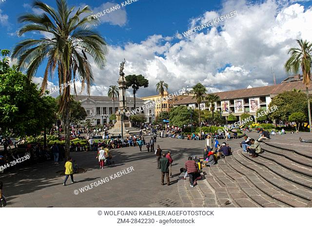 People on the Plaza Grande (formally known as Plaza de la Independencia) in the historic center (UNESCO World Heritage Site) of the city of Quito, Ecuador