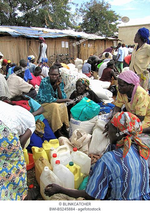 refugee camp for internally displaced people in northern Uganda around Gulu, the non-governmental organisation 'Norwegian Refugee Council' is distributing food...