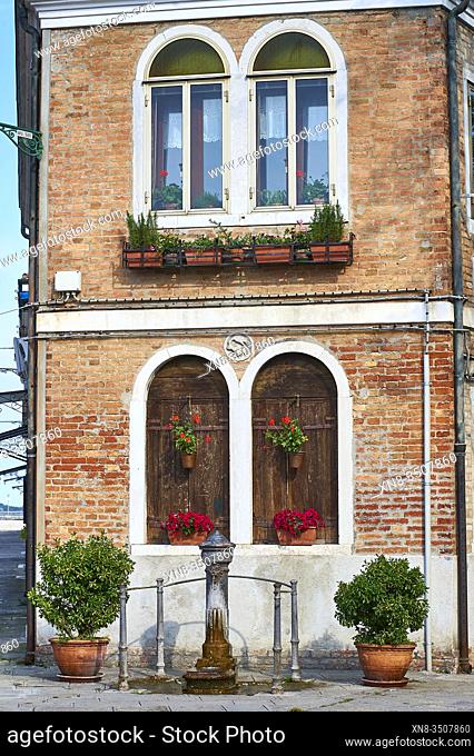 Detail of architecture and Iron Fountain in Murano, Venice, Veneto, Italy