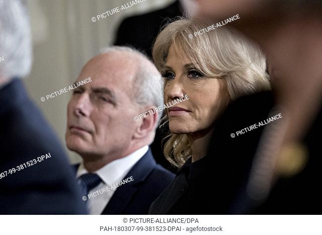 Kellyanne Conway, senior advisor to U.S. President Donald Trump, and John Kelly, White House chief of staff, left, listen during a news conference with U