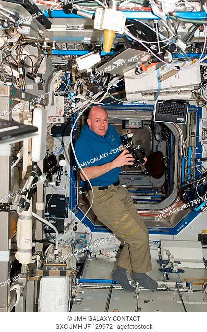 European Space Agency astronaut Andre Kuipers takes pictures in Node 2 (Harmony) aboard the International Space Station. The Expedition 3031 flight engineer...