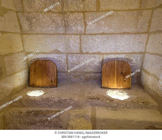 Simple medieval toilet in the Castillo de Belmonte castle, Belmonte, Cuenca province, region of Castile-La Mancha, Spain