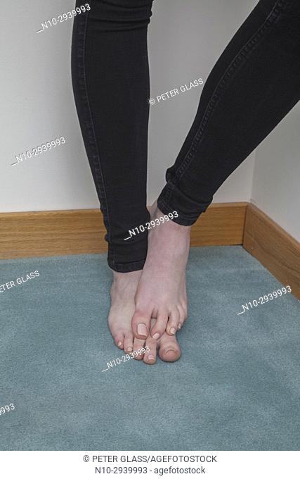Teenage girl's legs and bare feet