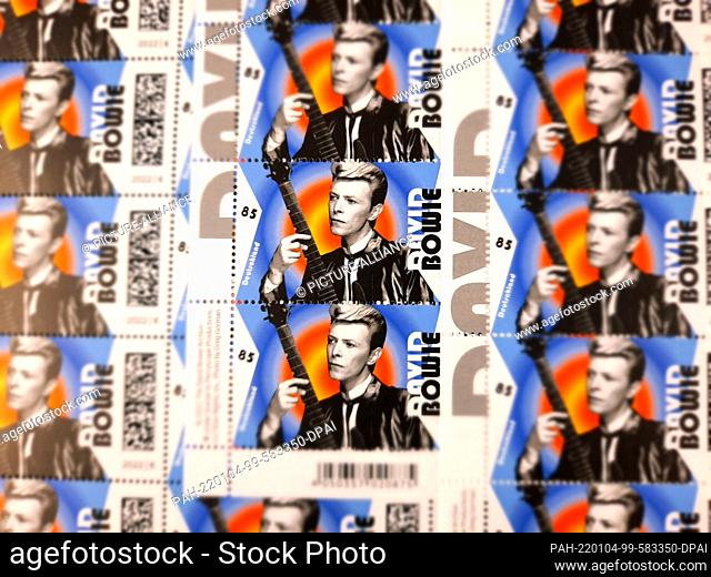 03 January 2022, Berlin: An 85 cent stamp with a portrait of the singer David Bowie. Deutsche Post has issued a special stamp to mark the pop icon's 75th...