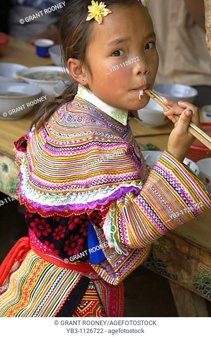 Child From The Flower Hmong Hill Tribe, Eating Noodles, Coc Li Market, Sapa, Vietnam