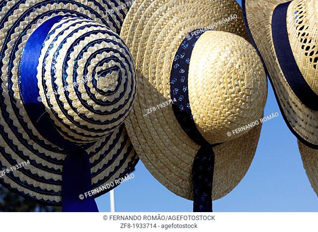 Straw hat for sale at a street market, on Santa Comba Dão, Portugal