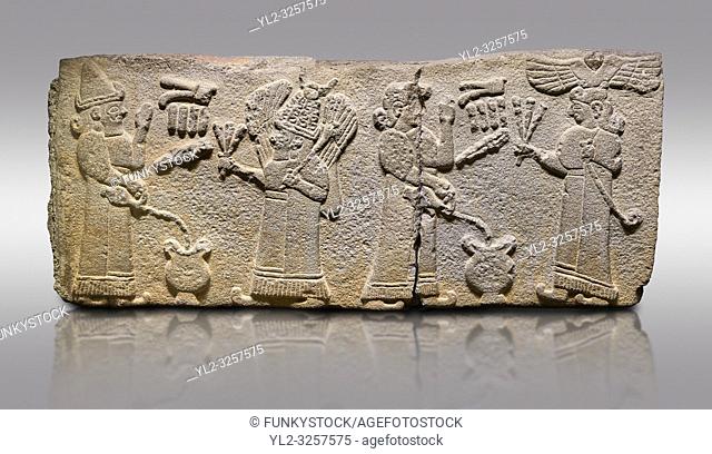 Aslantepe Monumental Hittite relief sculpted orthostat stone panel. Limestone, Aslantepe, Malatya, 1200-700 B. C. . . Scene of the king's offering drink and...