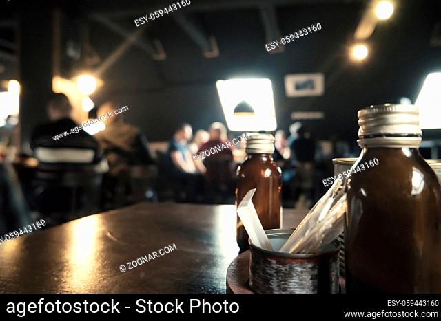 Hipster paradise. Hall of Coffee shop blurred background with bokeh effect and vintage color tone