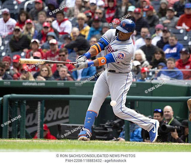 New York Mets second baseman Robinson Cano (24) strikes out swinging in the first inning against the Washington Nationals at Nationals Park in Washington
